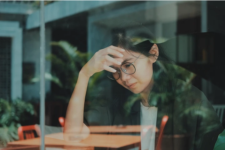 young woman looking depressed